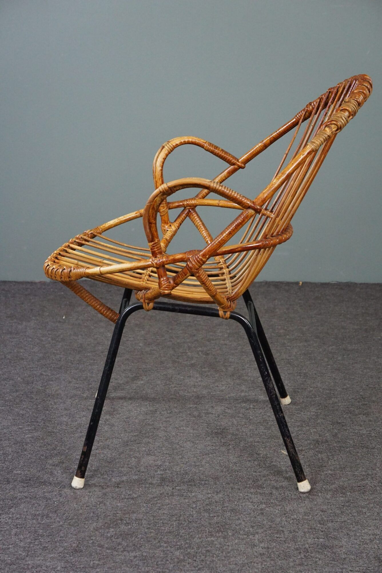 Dark rattan armchair with armrests Dutch Design 1960