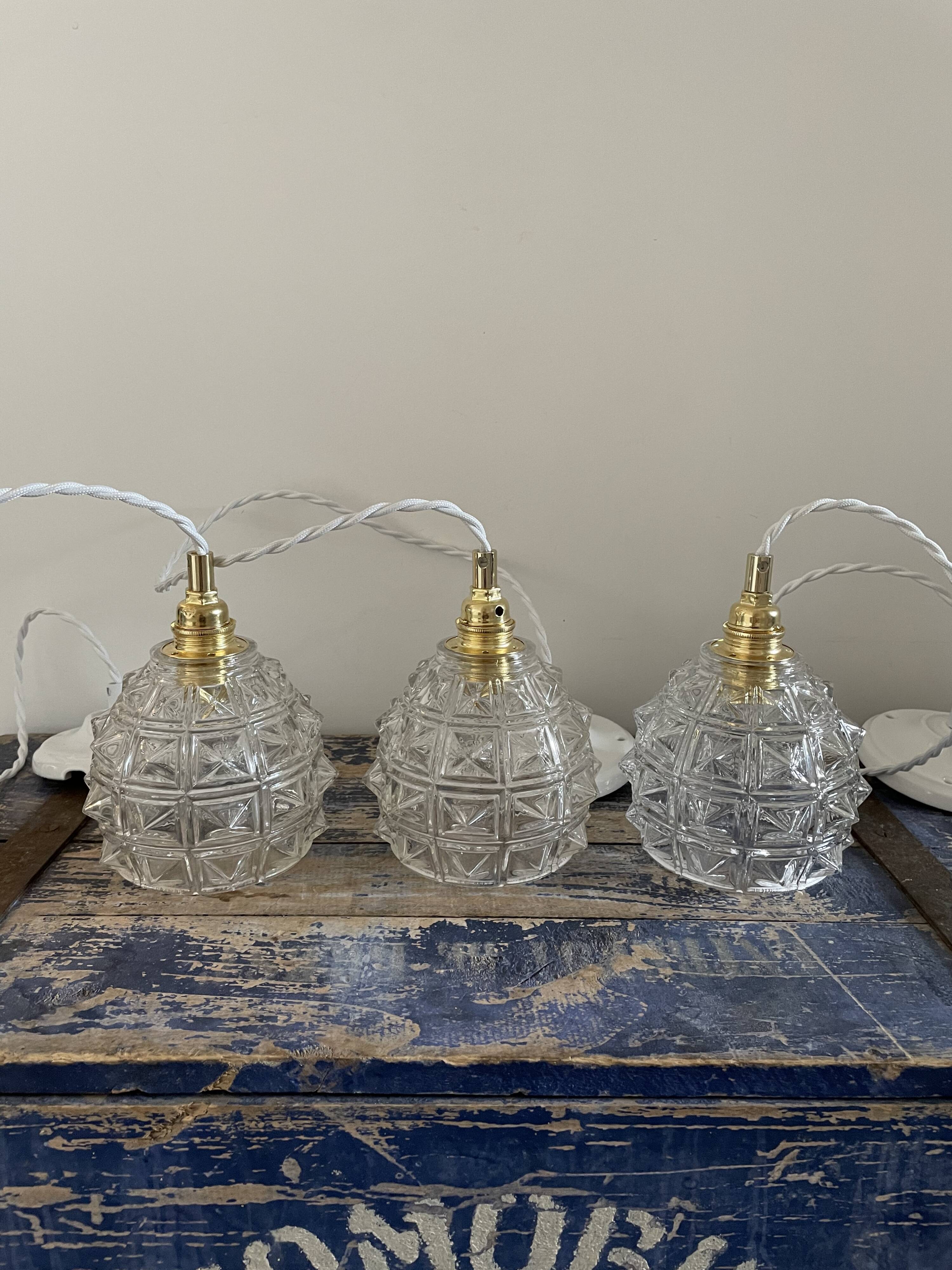 Set of three new electrified chiseled glass suspensions