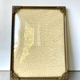 Metal frame in gold colored brass
