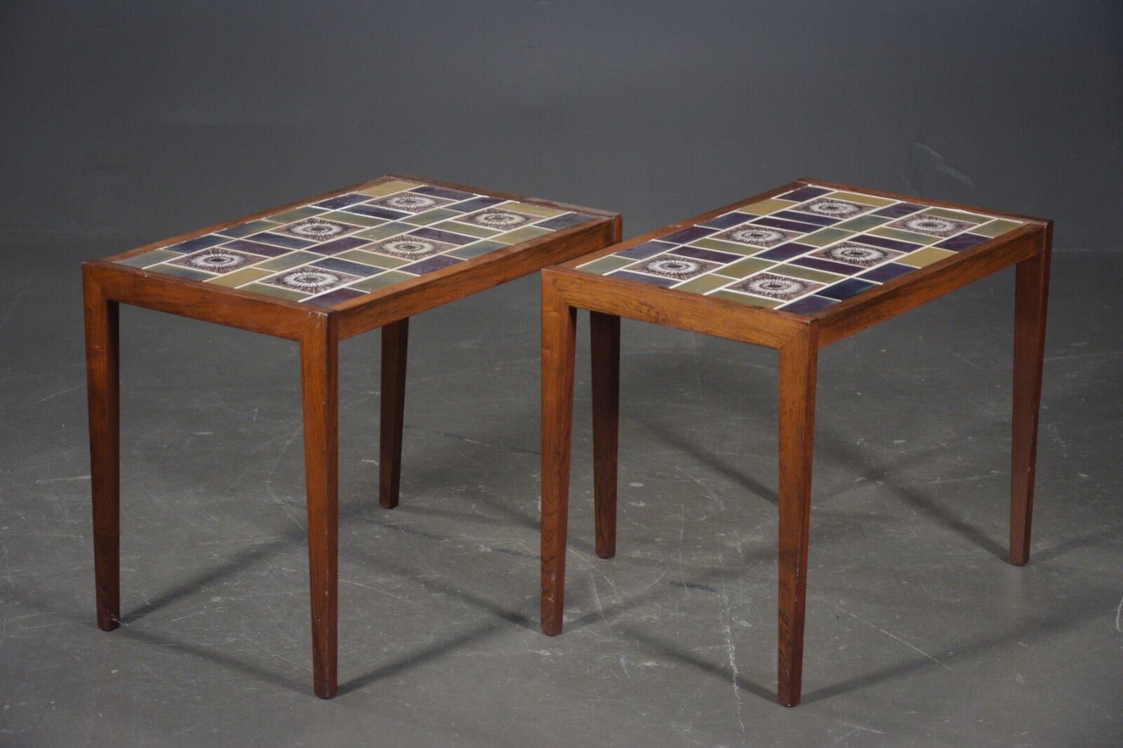 Pair of rosewood lamp tables, inlaid with coloured tiles