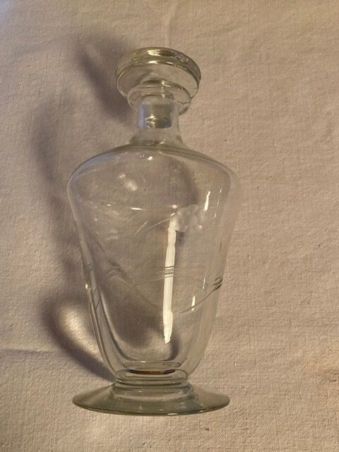 Glass carafe engraved with flowers