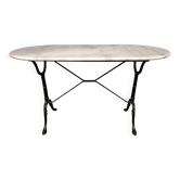 Oval bistro table in white marble with a black cast iron base - 120 cm