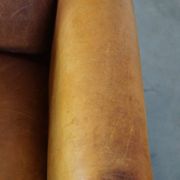 Stately, sleekly finished, comfortable sheepskin armchair