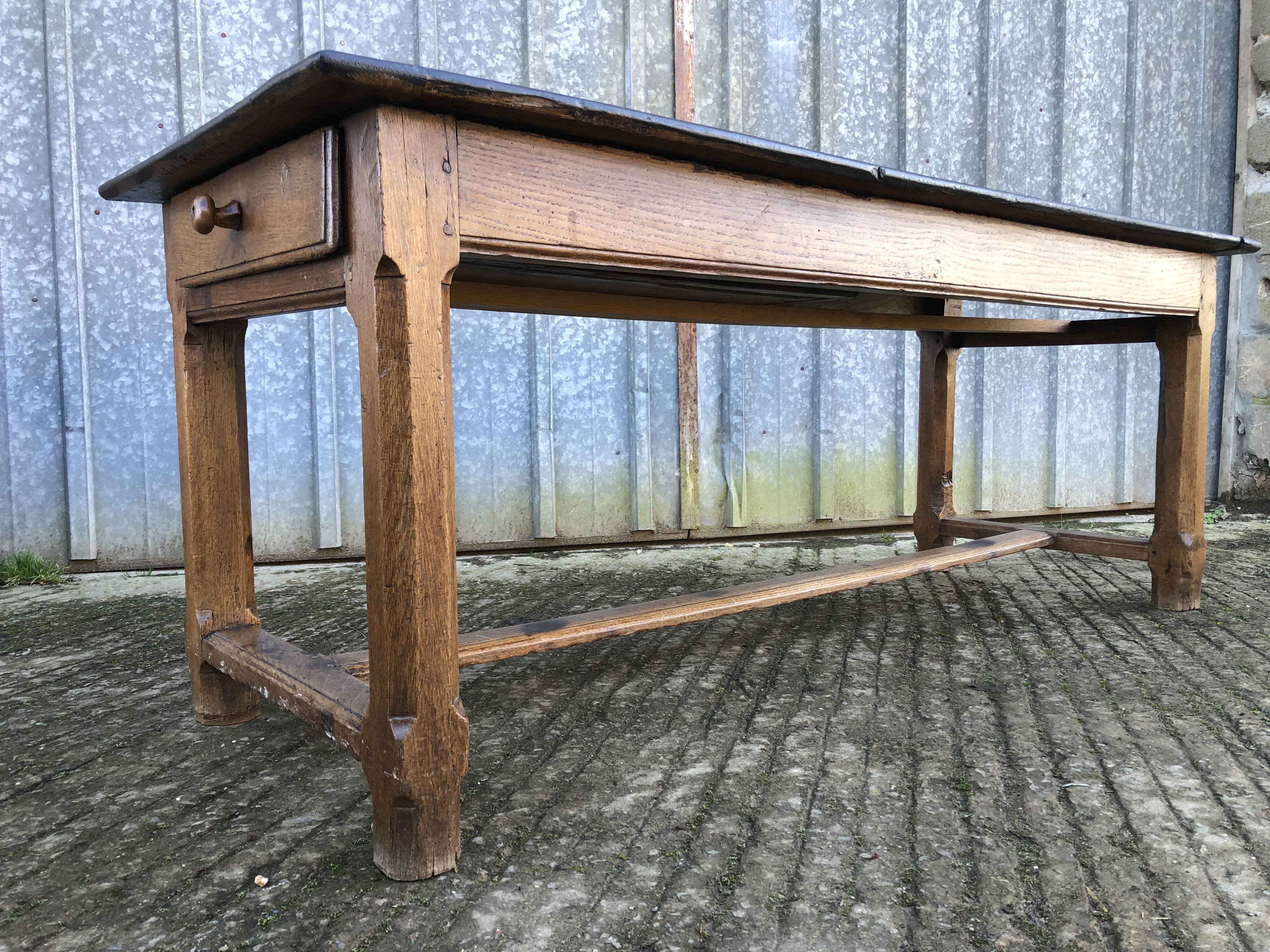 Antique oak farmhouse table with cat bar and 2 end drawers