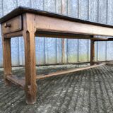 Antique oak farmhouse table with cat bar and 2 end drawers