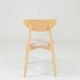 Set of 6 soft pink fabric dining chairs, Scandinavian design, natural wood.