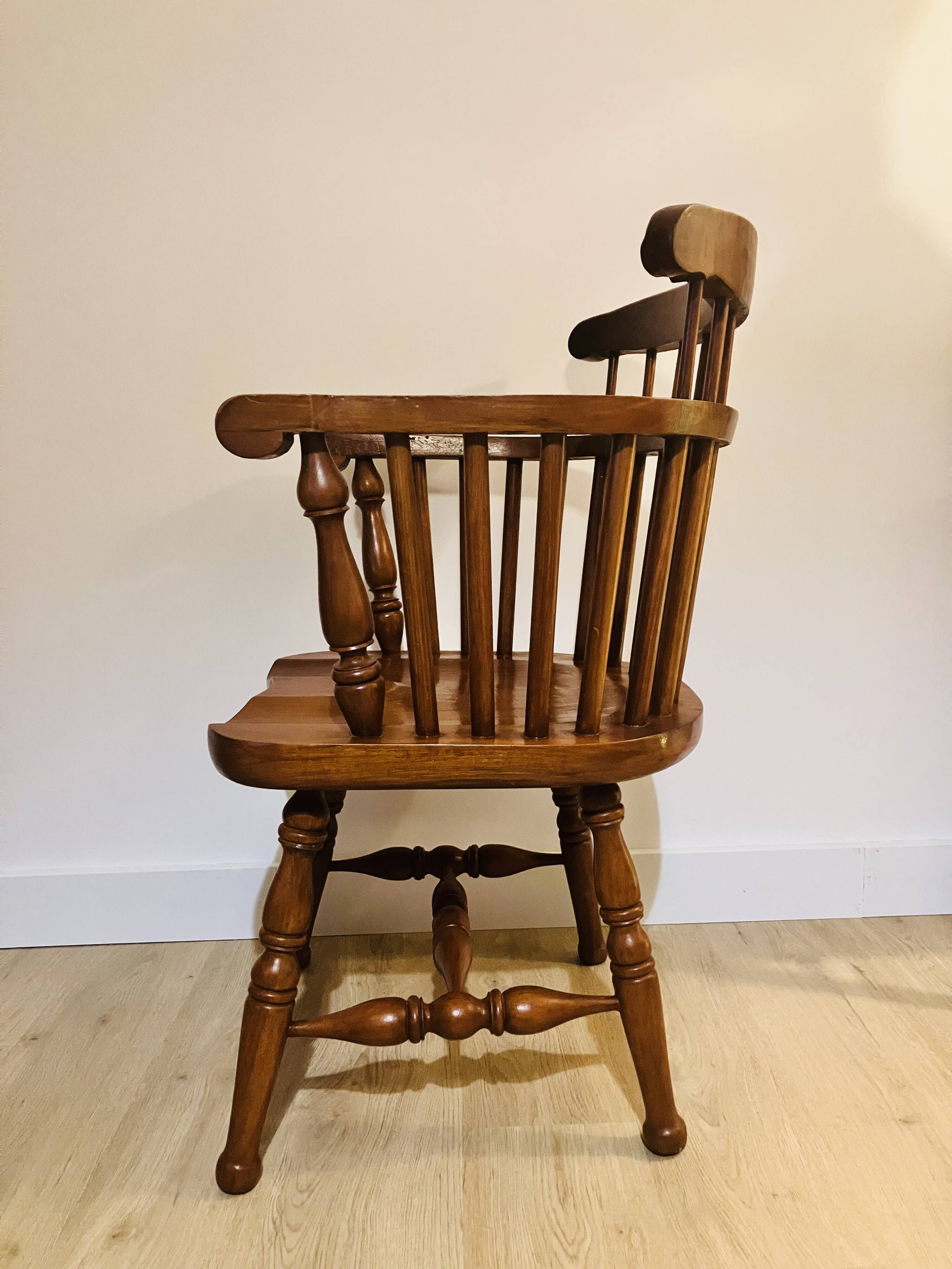 Solid wood chair with armrests