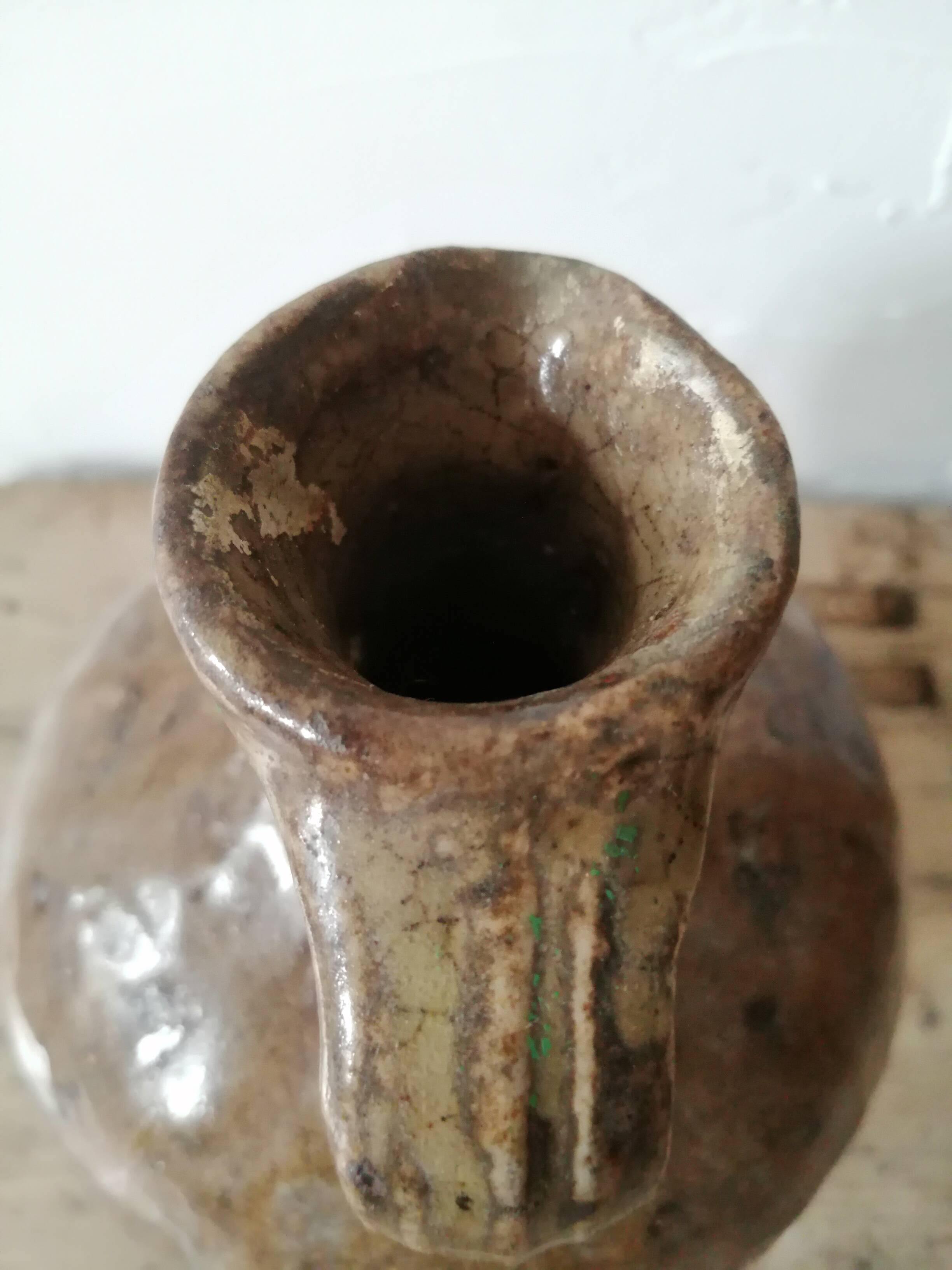 Small very old glazed jug