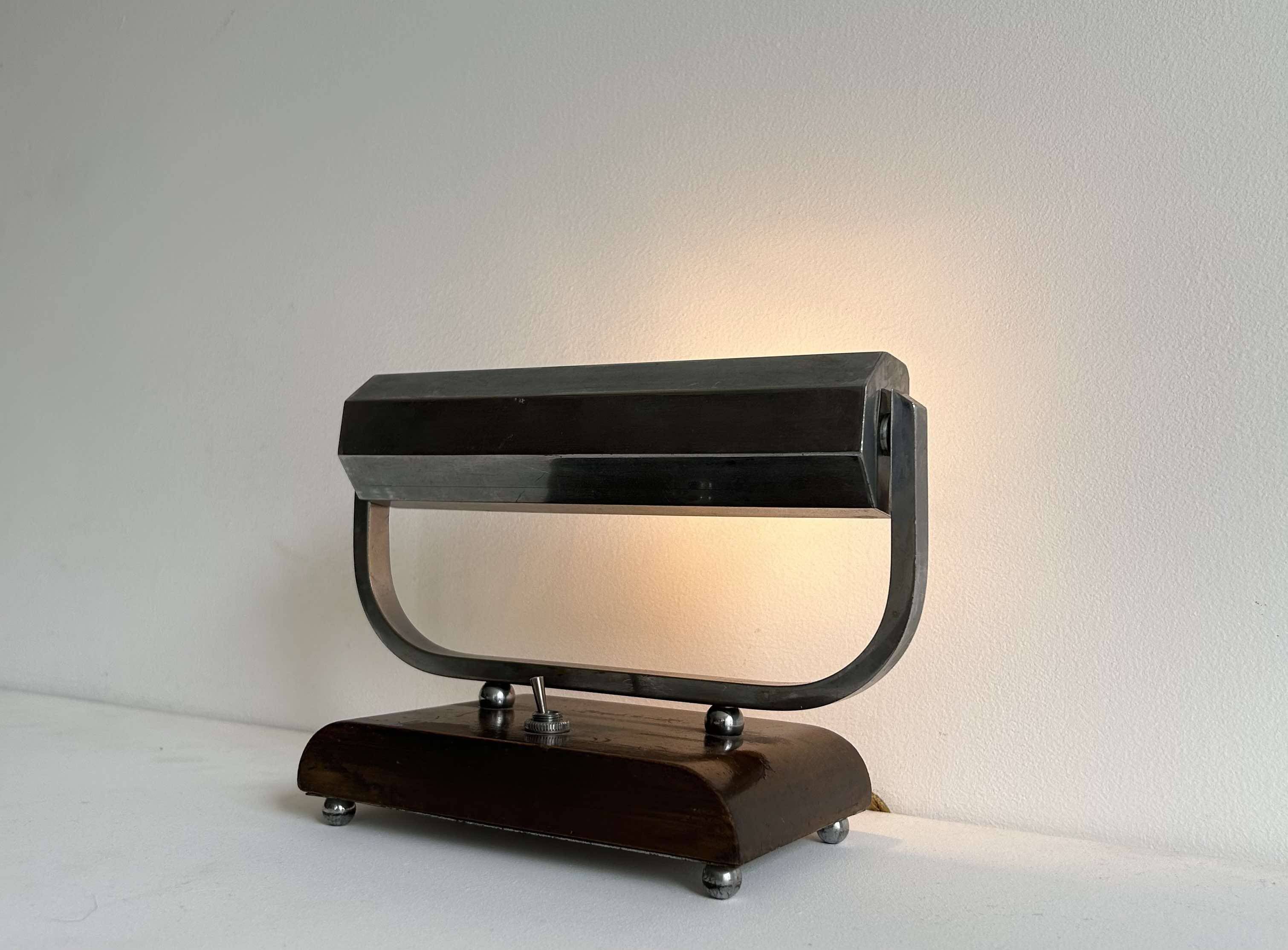 Modernist art deco desk lamp, chromed metal and wood, France 1930