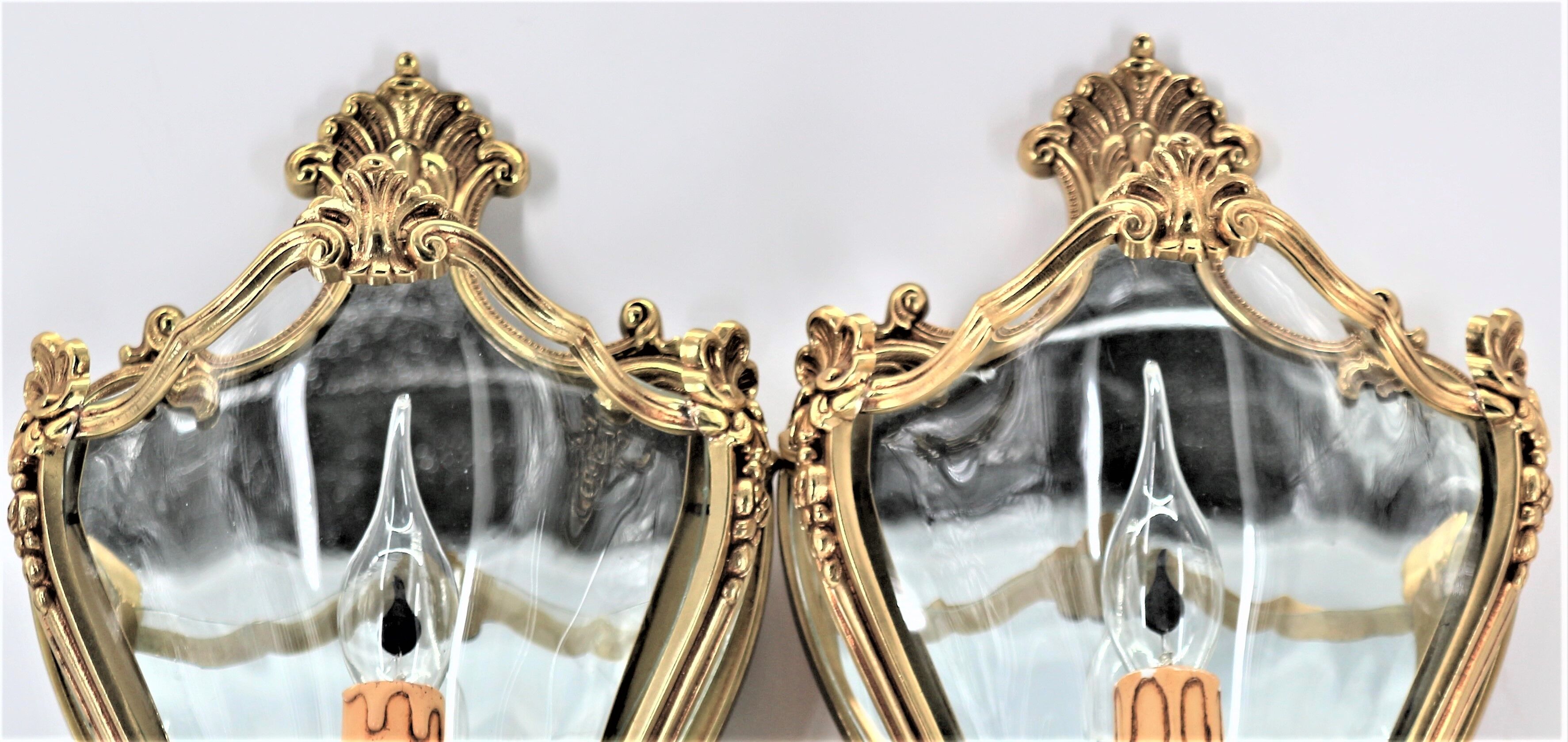 Pair of Louis XV style appliques in solid bronze & curved glass