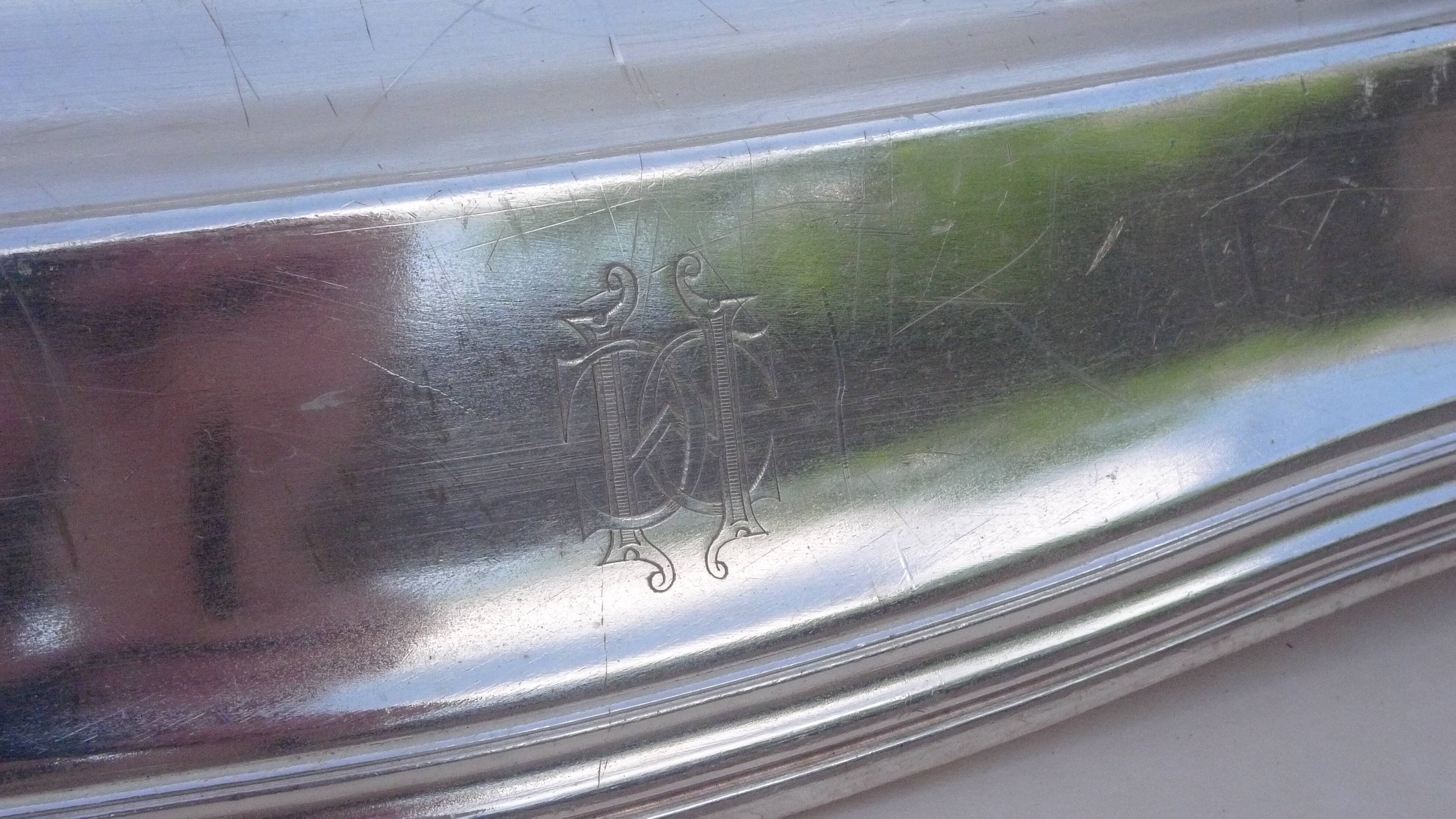 very large silver-plated metal tray