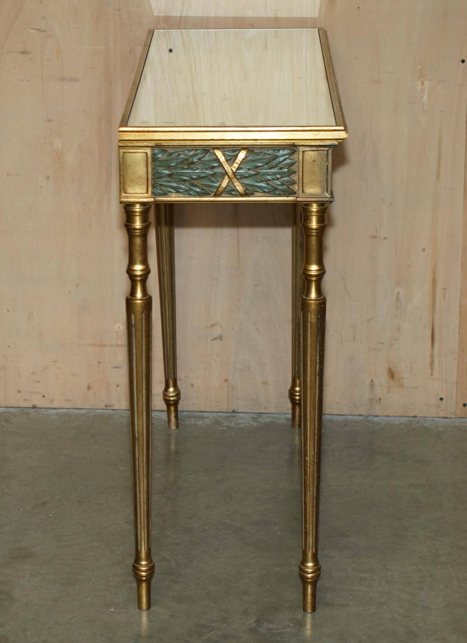 Italian vintage console with a glass mirror top.