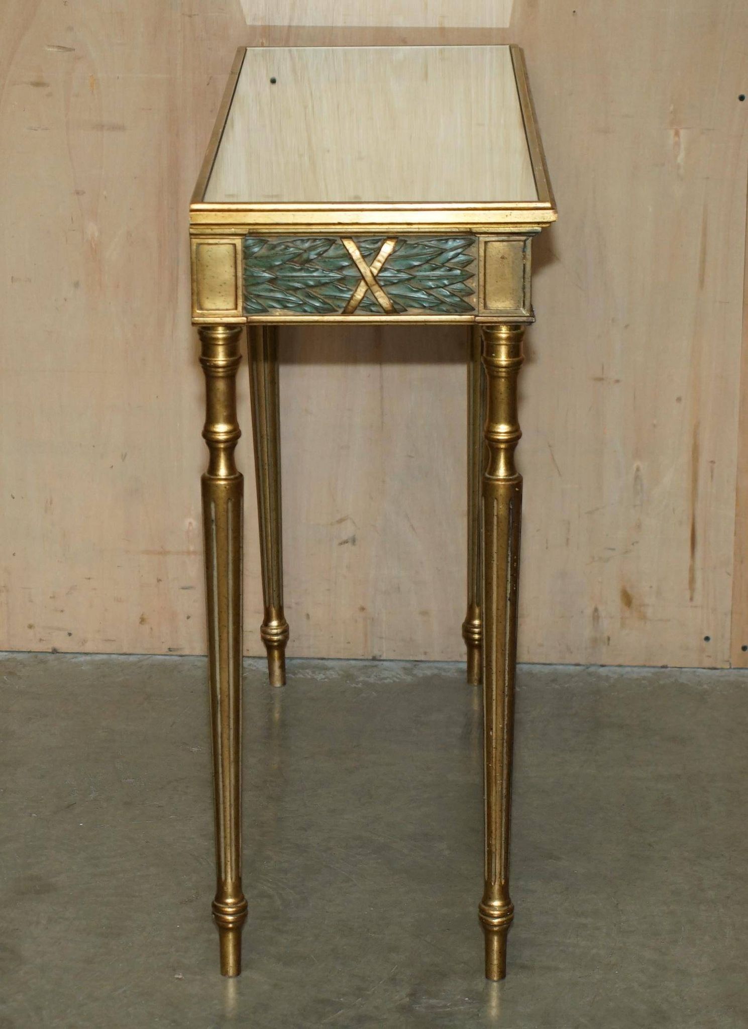 Italian vintage console with a glass mirror top.