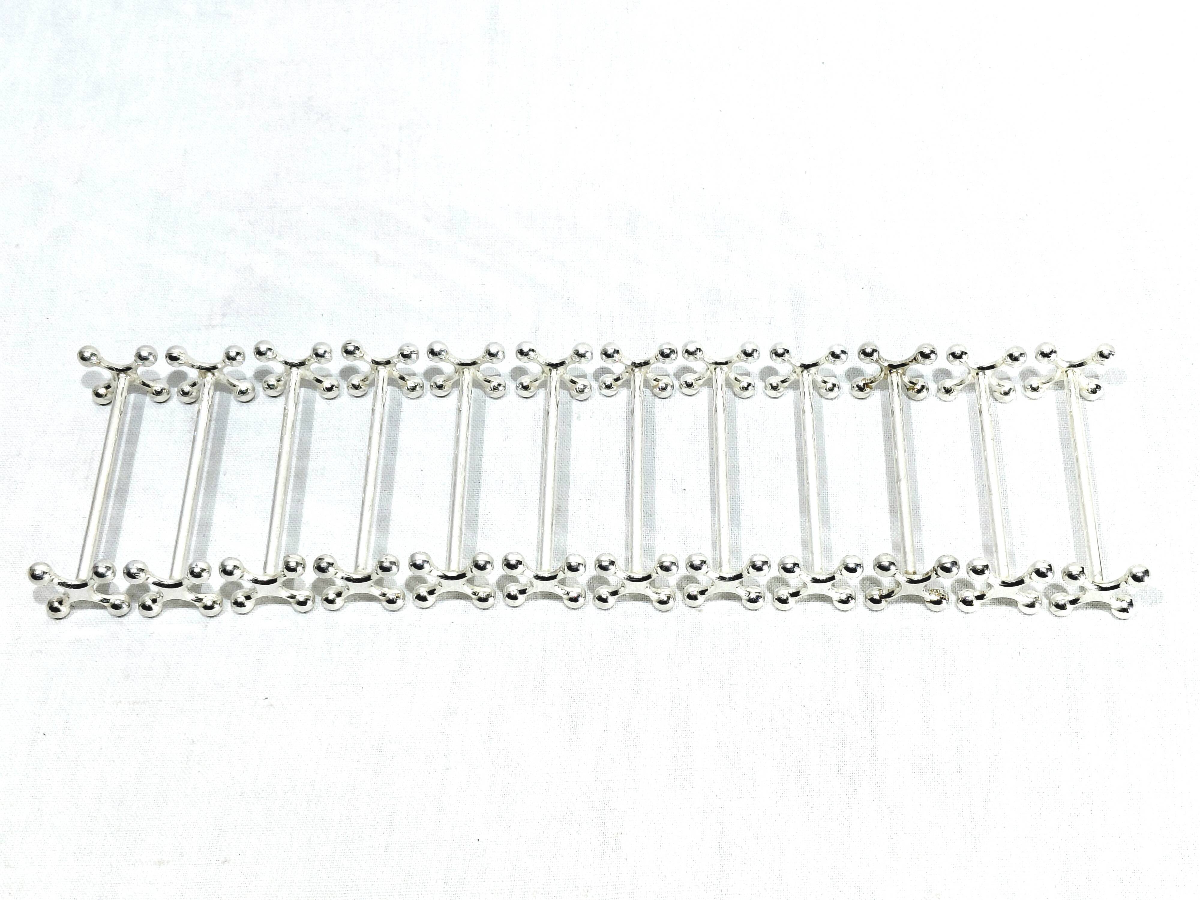 CHRISTOFLE - 12 BALL-END KNIFE RESTS