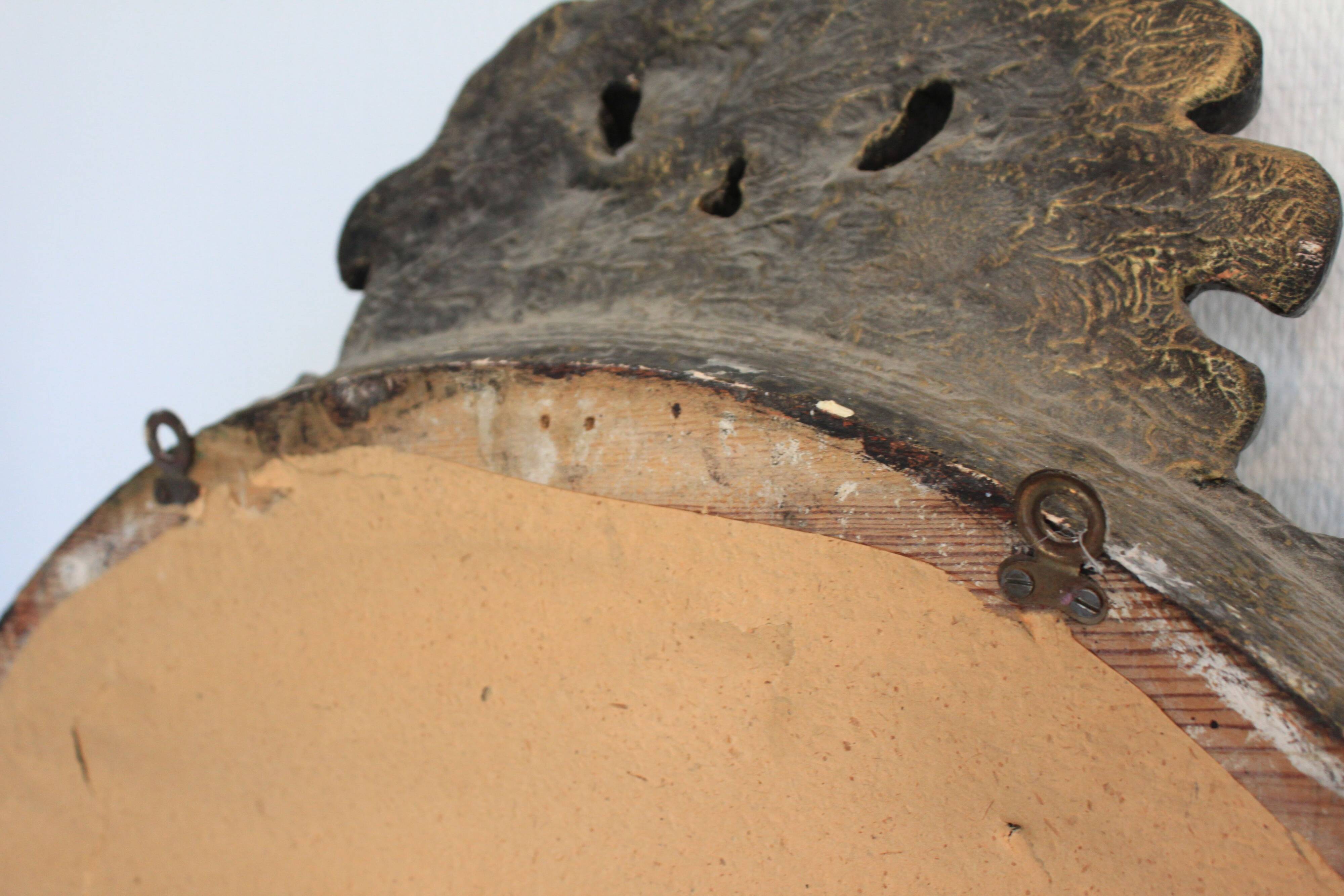 Baroque “trumeaux” mirror in carved solid wood.