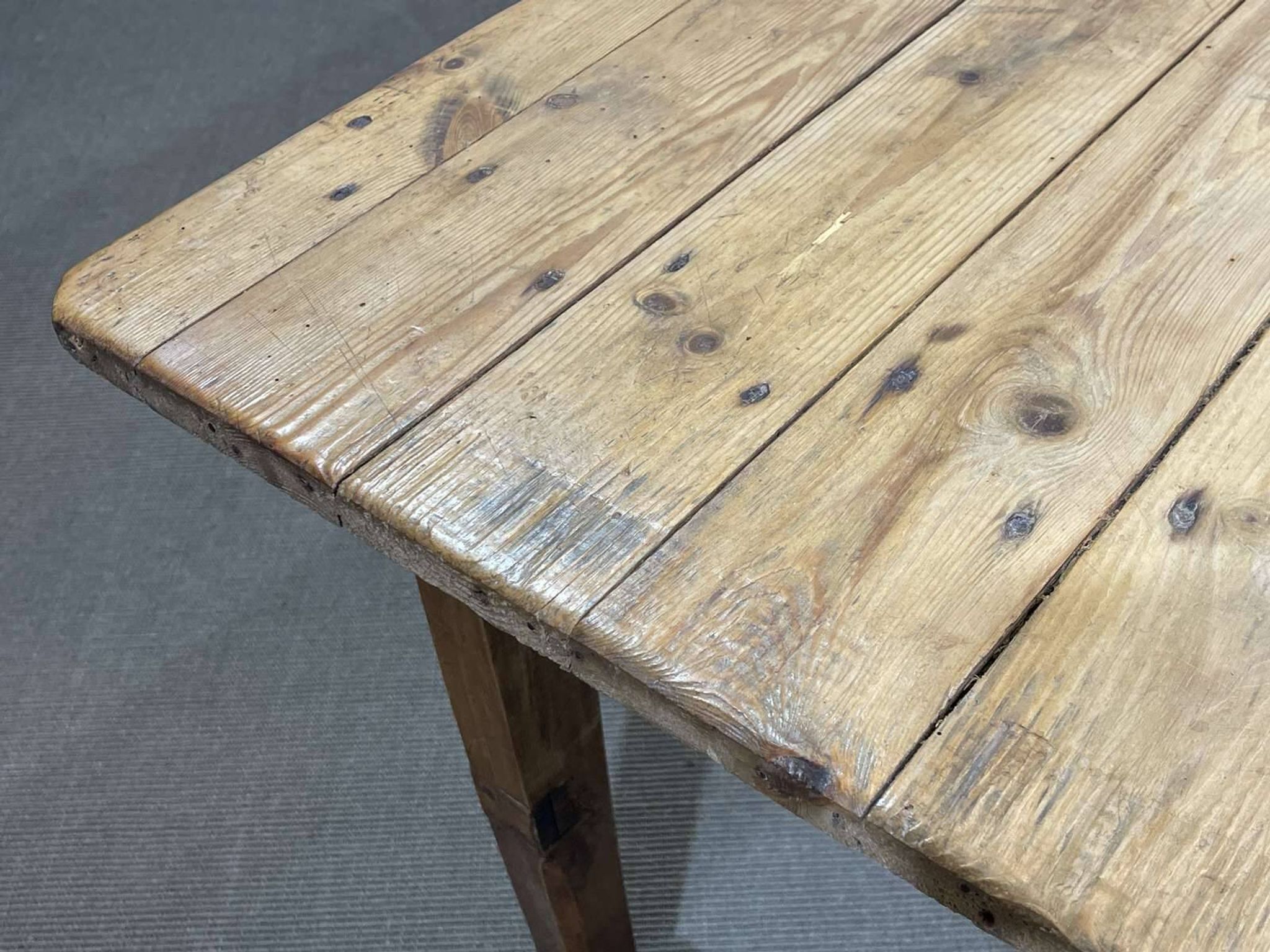 Early 20th-century farmhouse table made of fir, elm, and chestnut.