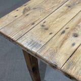 Early 20th-century farmhouse table made of fir, elm, and chestnut.