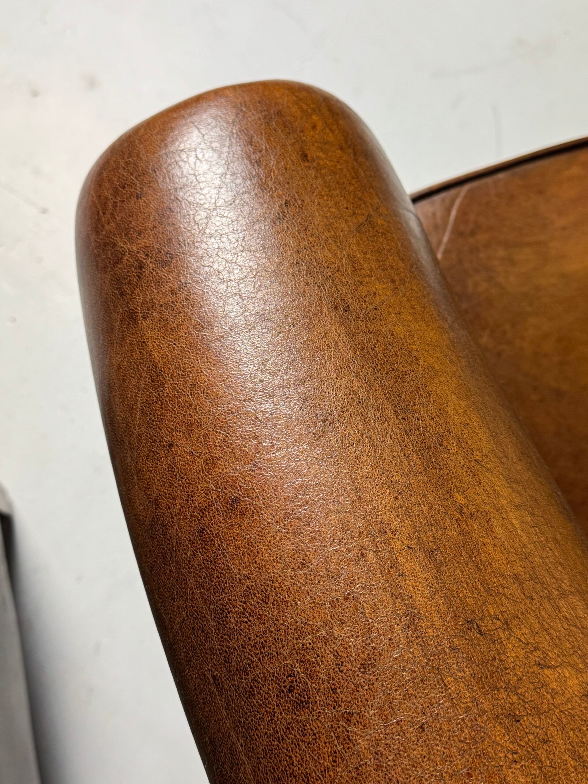 Fauteuil club en peau de mouton 2x classique