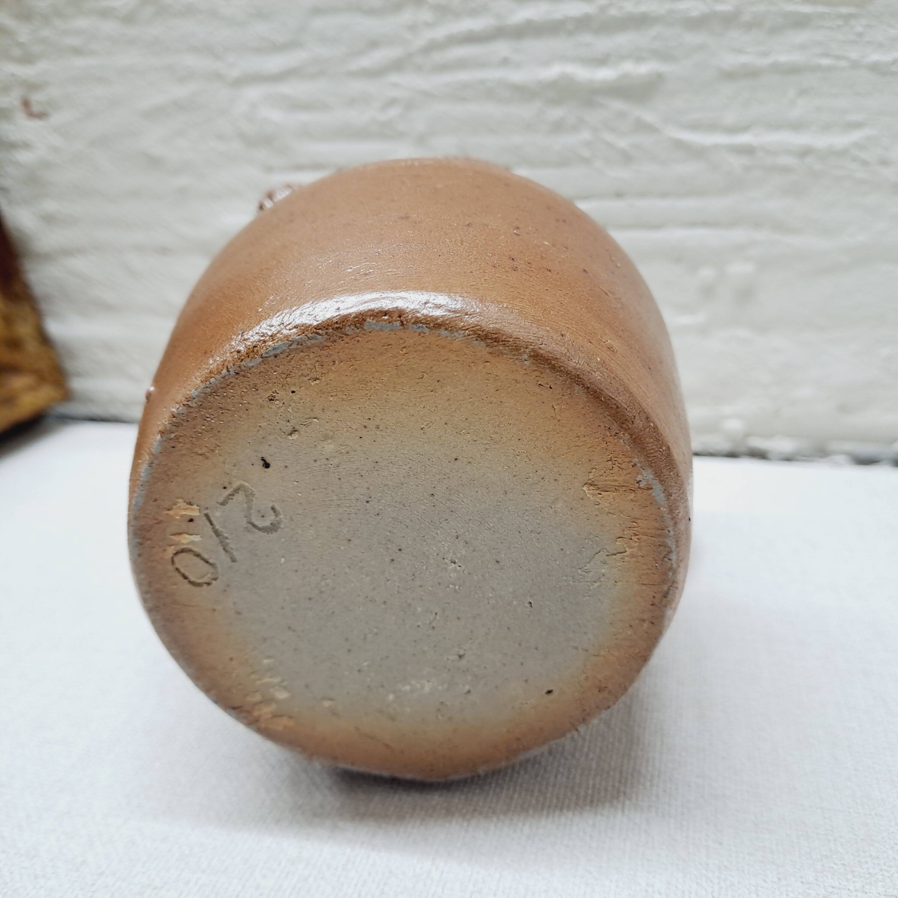 Antique stoneware milk jug