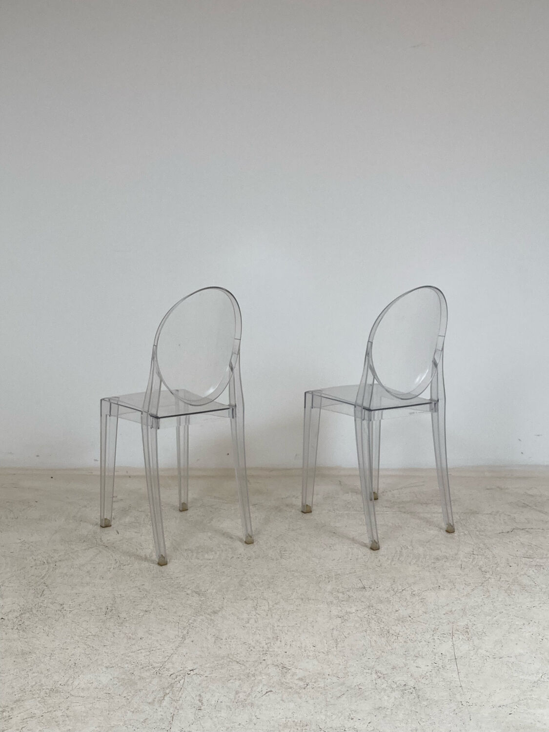 Pair of Victoria Ghost chairs by Philippe Starck Kartell edition