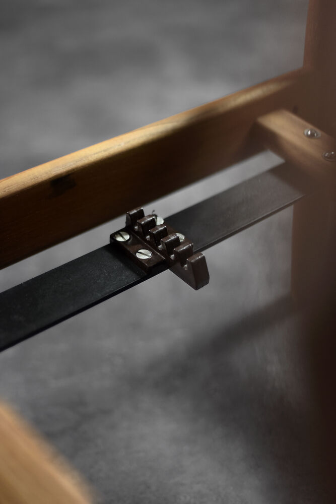 High teak and brown leather armchair with reclining backrest, mid-century Danish style, 1960s.
