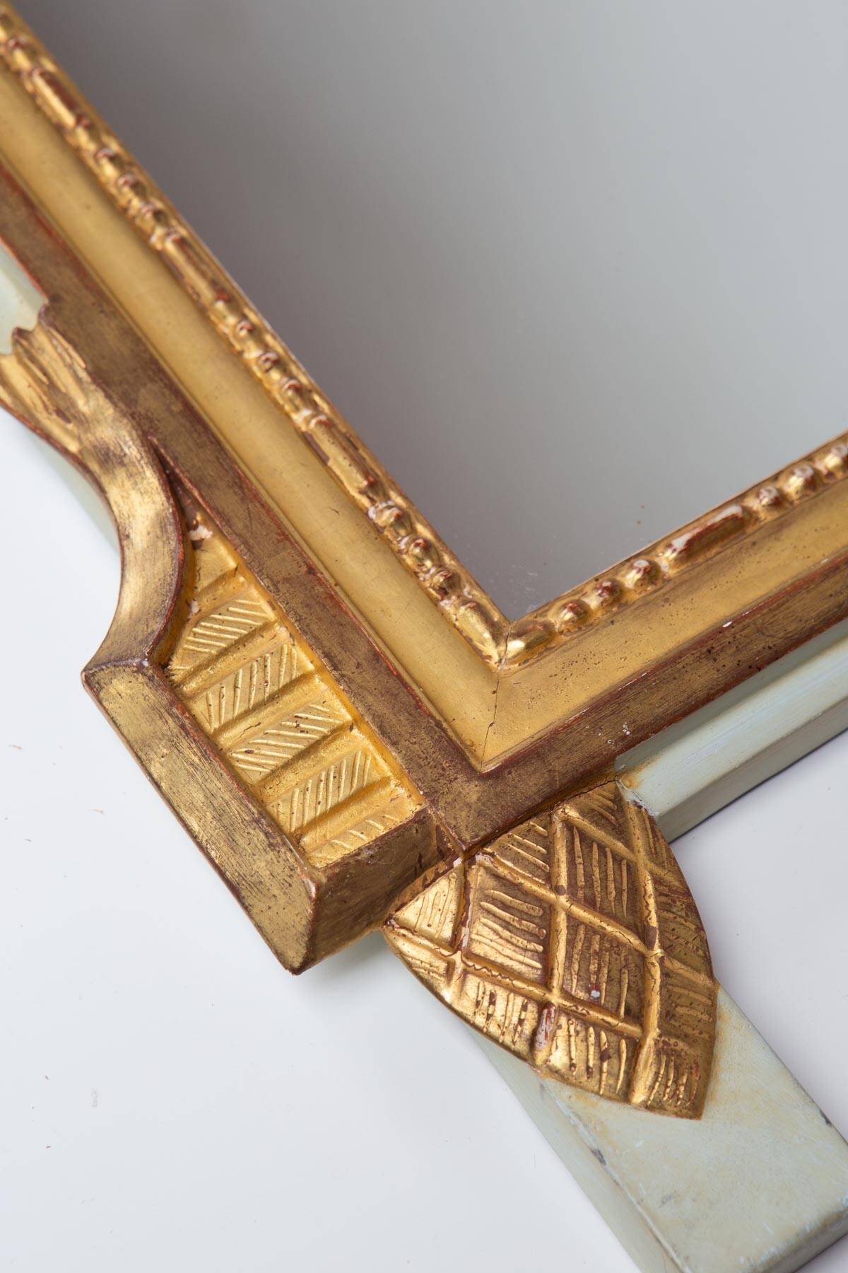 French gold mirror with a Louis XVI style pediment c. 1940/50 (95*54 cm)