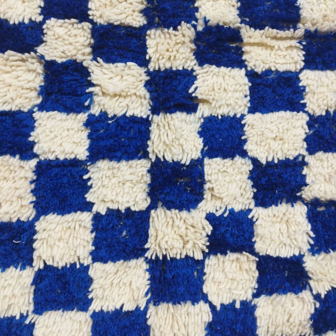 Moroccan Berber rug with a blue and ecru checkerboard pattern – 250 x 147 cm