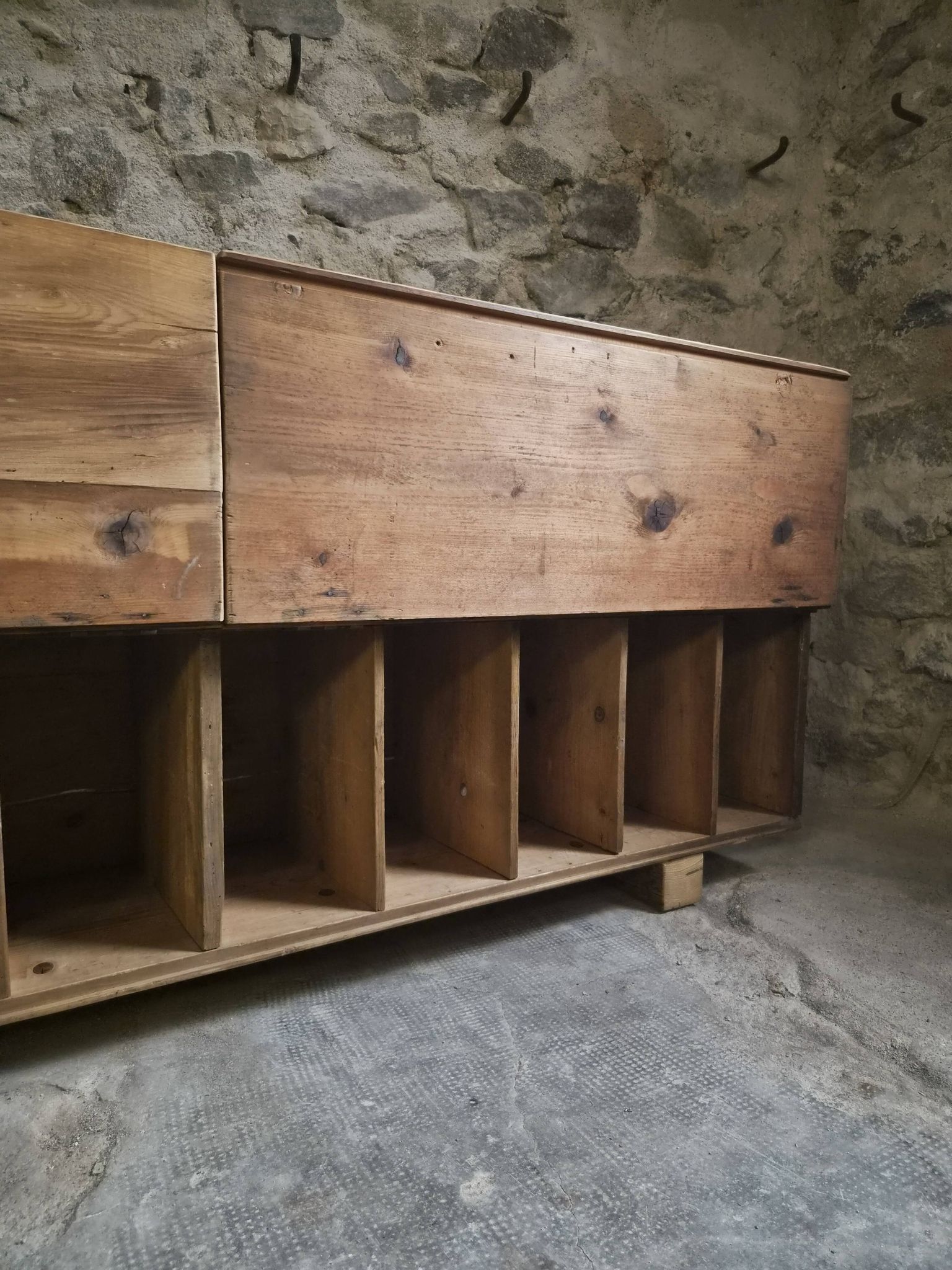 Old French industrial workshop furniture in pine / storage bench, circa 1880–1900