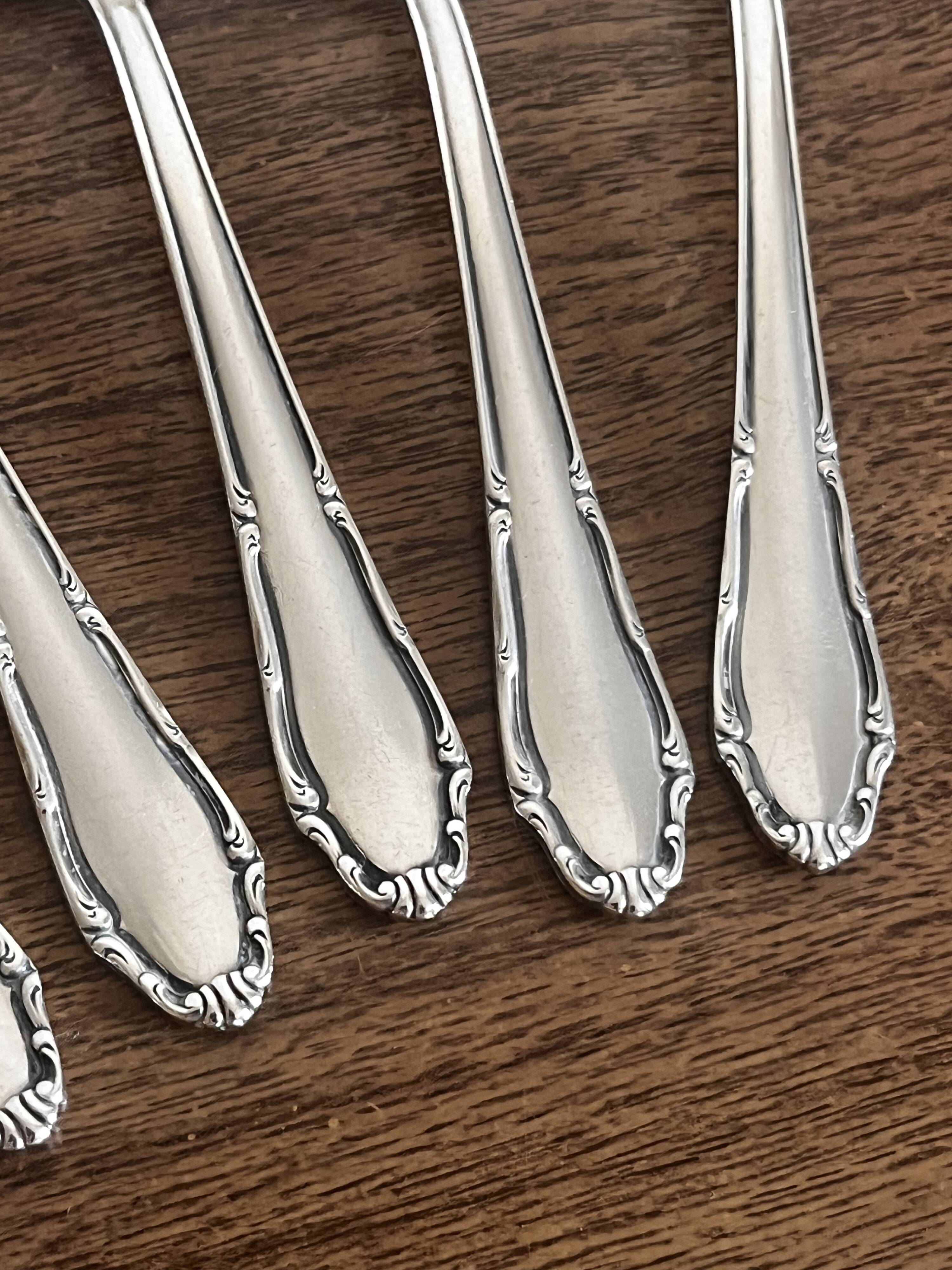 Small silver-plated metal spoons