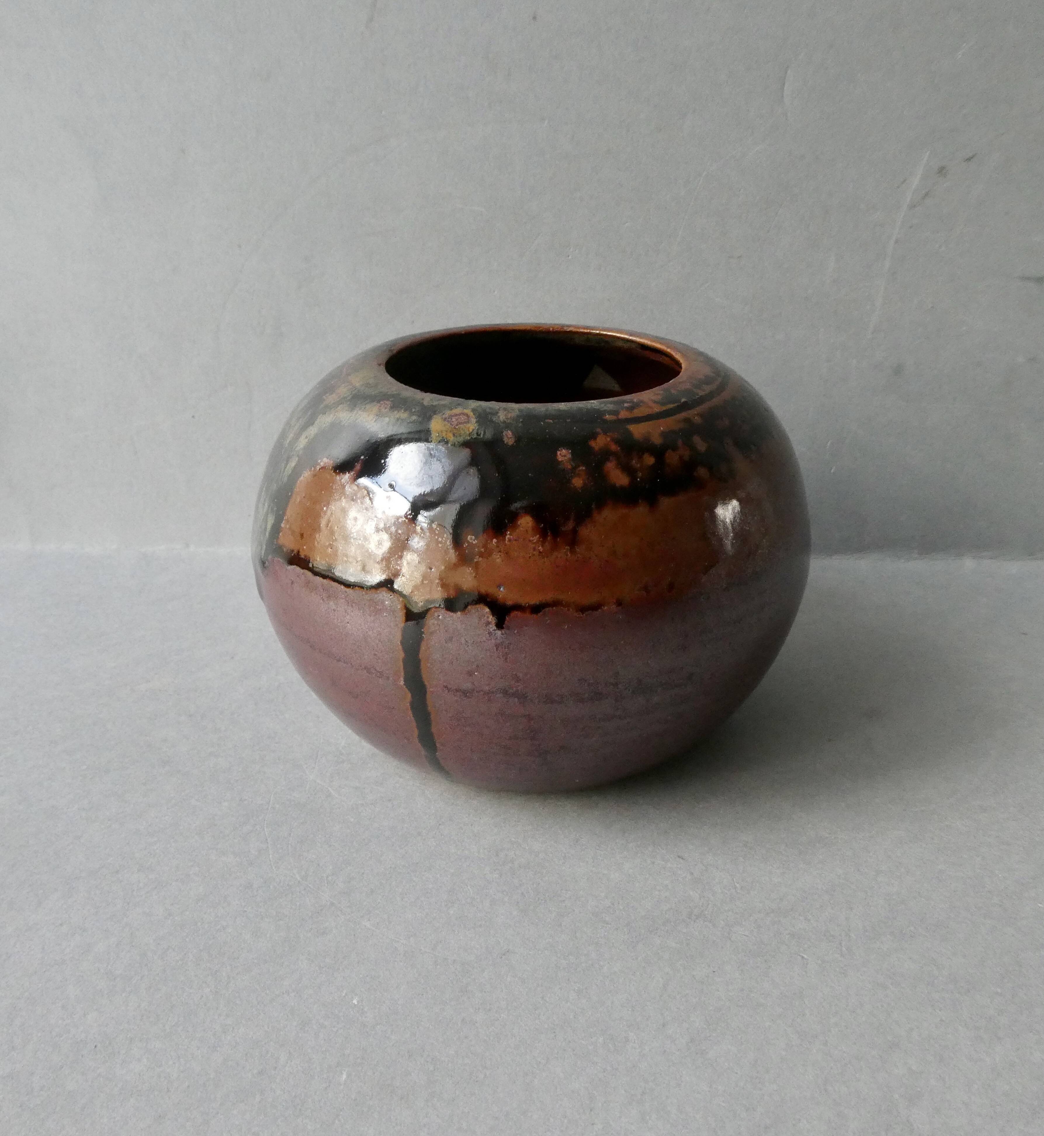 Sandstone ball vase signed Yves Remond