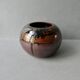 Sandstone ball vase signed Yves Remond
