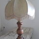 Turned wood table lamp with “skin” shade