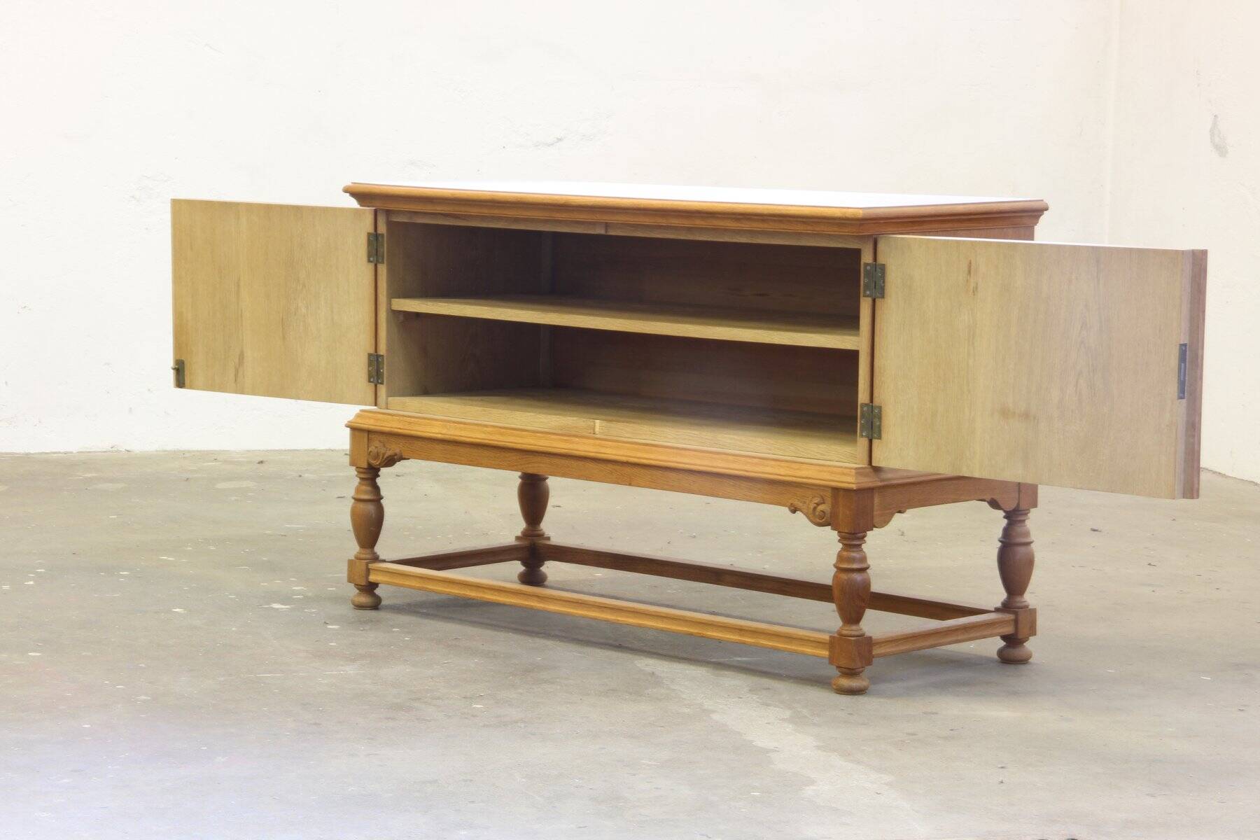 Vintage low sideboard in oak by Henning Kjærnulf, 1960s