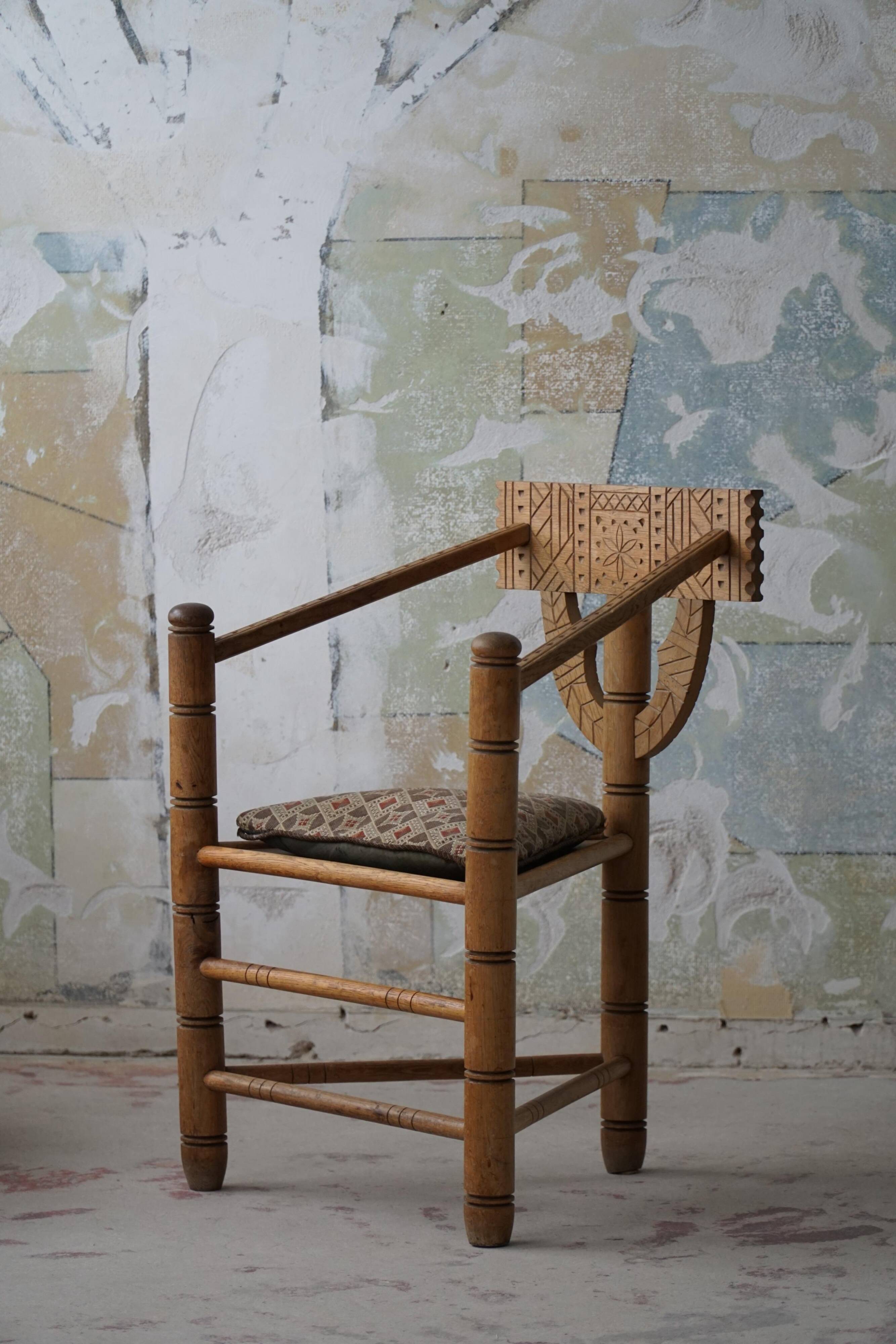 Carved monk's chair in solid oak, Wabi Sabi, Swedish, early 20th century.