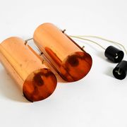 Two 50s tube pendant lamps consisting of two screwed-together copper bowls