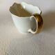 Villeroy and Boch gravy boat, 1950s, cream and gold
