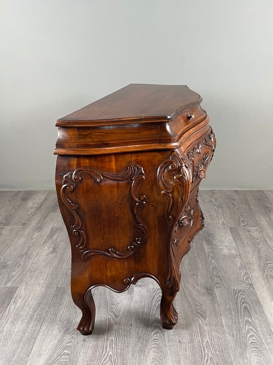 Curved commode in the Louis XV style, carved wood, 19th century.