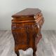 Curved commode in the Louis XV style, carved wood, 19th century.
