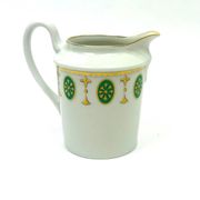 Set of 6 tea cups and 1 cream jug in Paris porcelain, Louis XVI decoration.