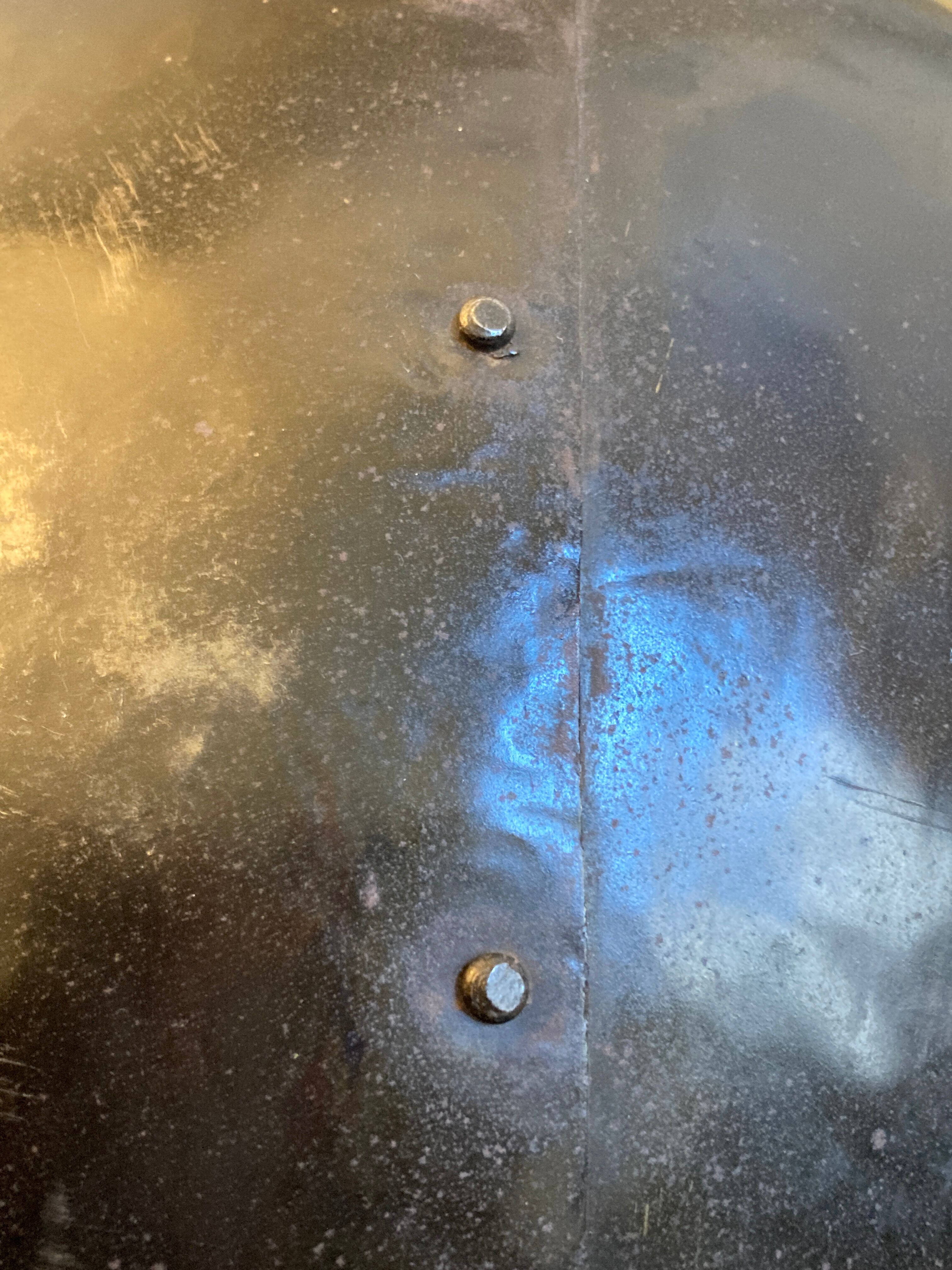 Atypical industrial furniture riveted sphere