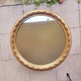 Large round mirror in Spanish gilded carved wood