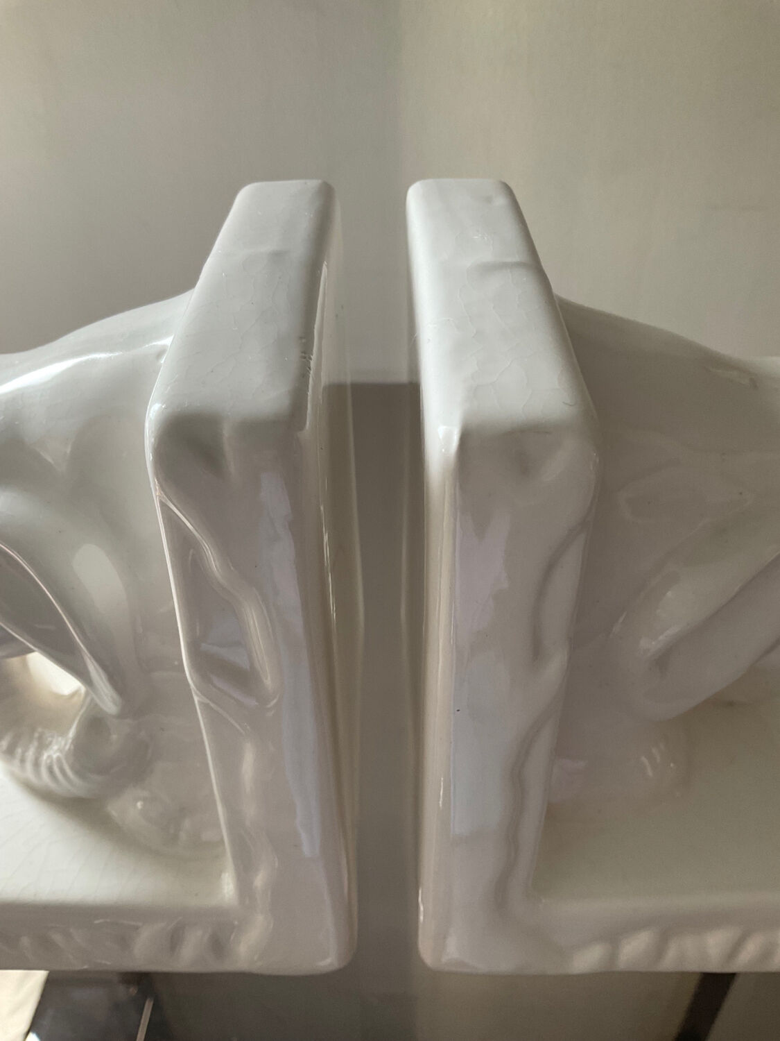 Pair of vintage enamelled ceramic elephant bookends