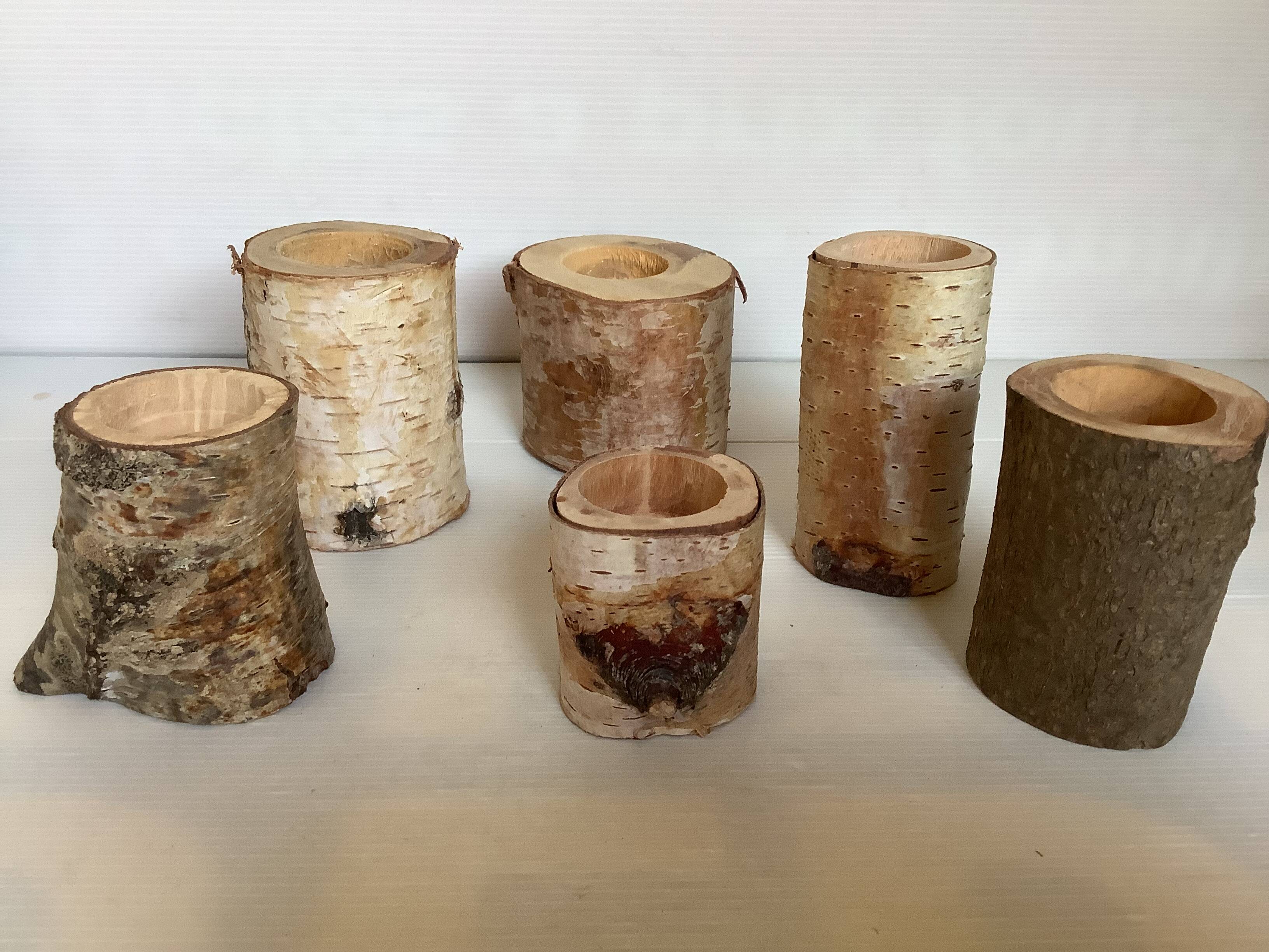 Six wooden candlesticks