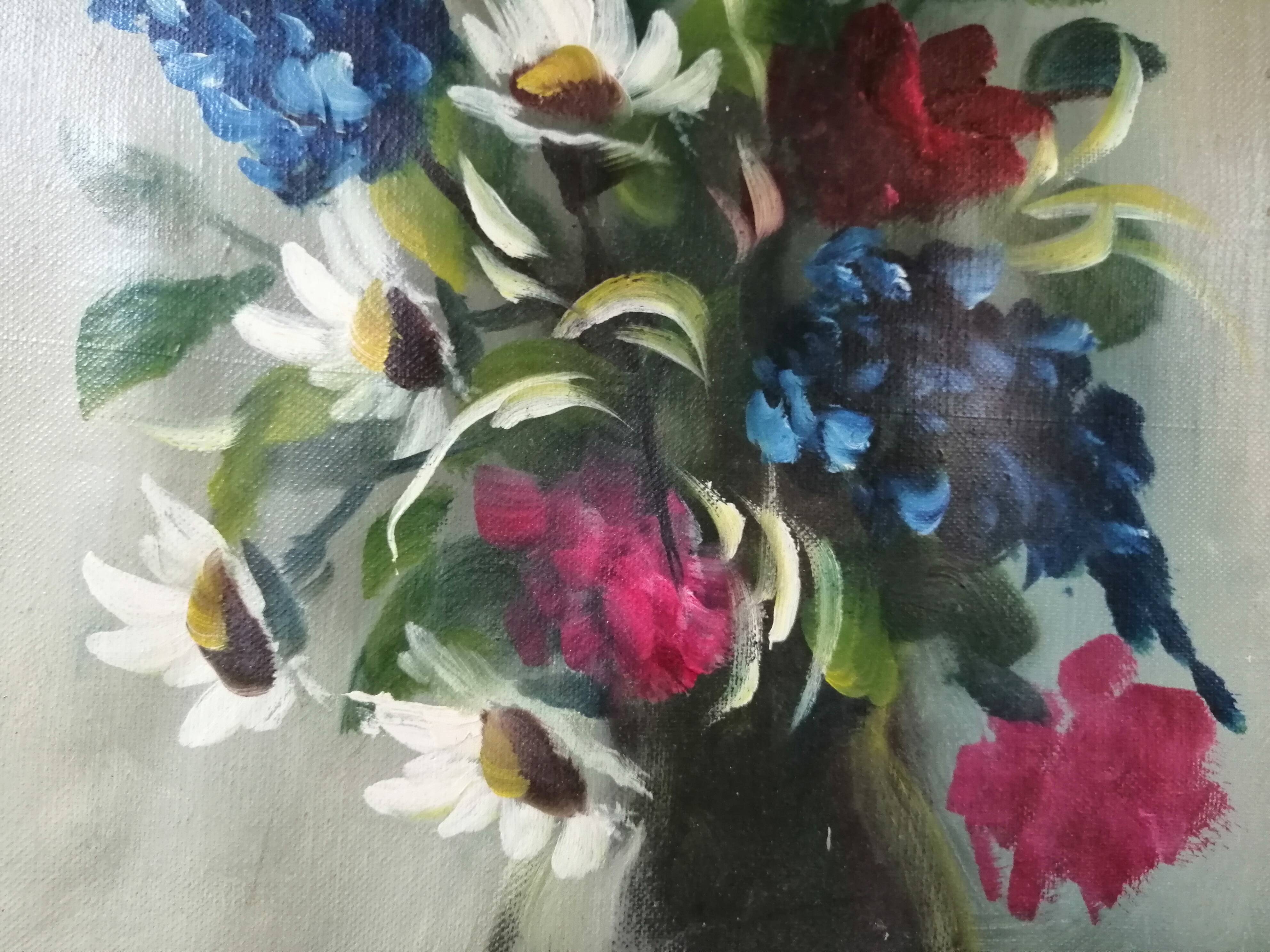 Still life with daisies and flowers in vase