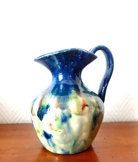 Set of art nouveau ceramic pitchers