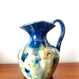 Set of art nouveau ceramic pitchers