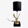 Brass lamp on black lacquered wooden base