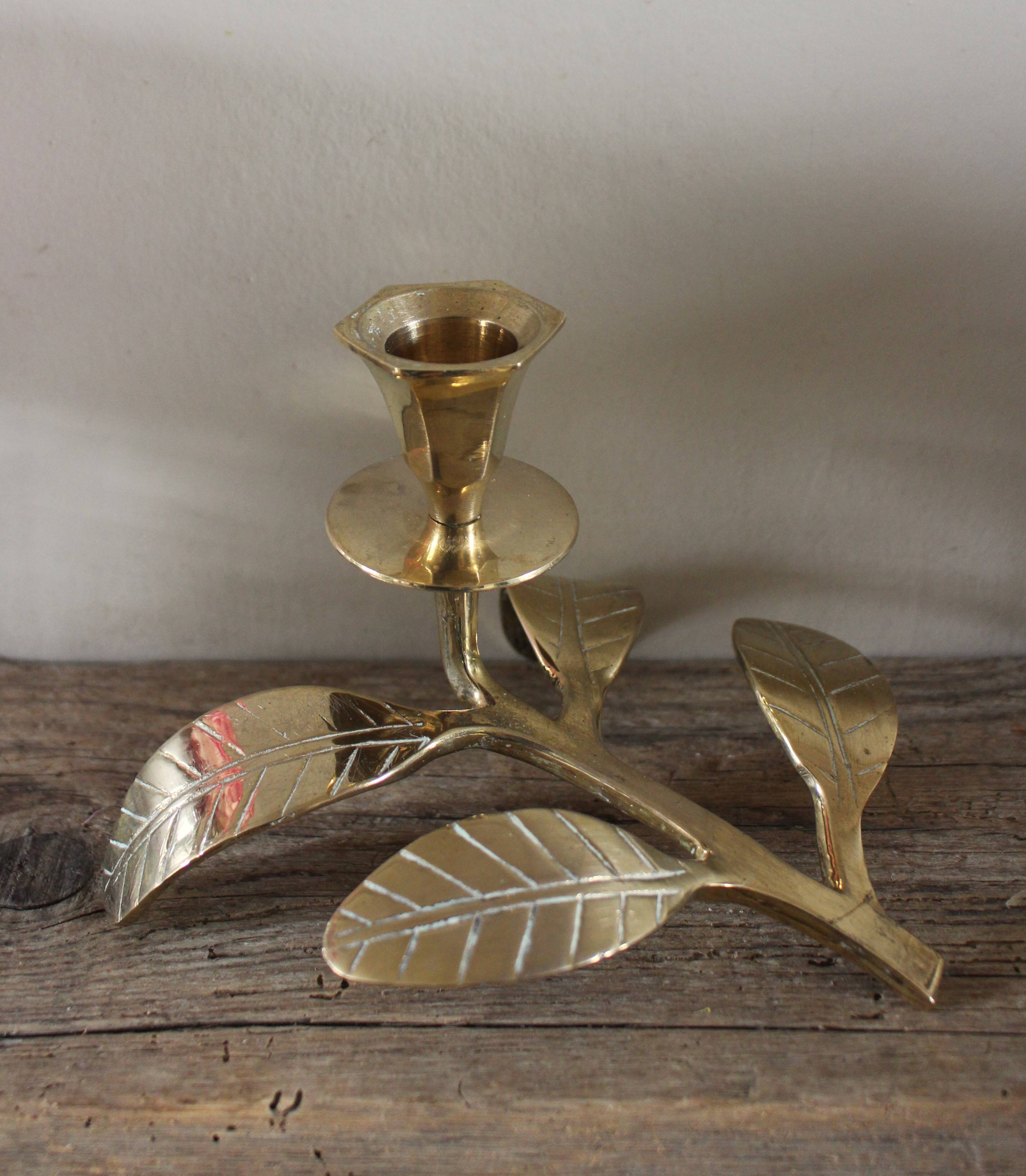 Brass candle holder with oval leaf branch
