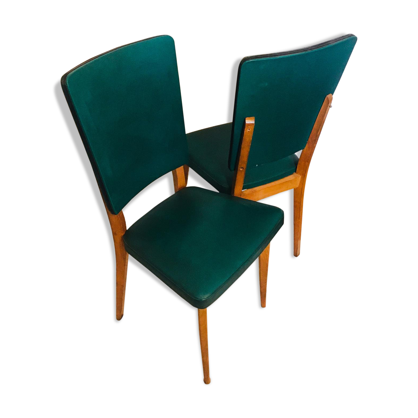 Two 1950s chairs made of wood and skai