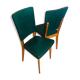 Two 1950s chairs made of wood and skai